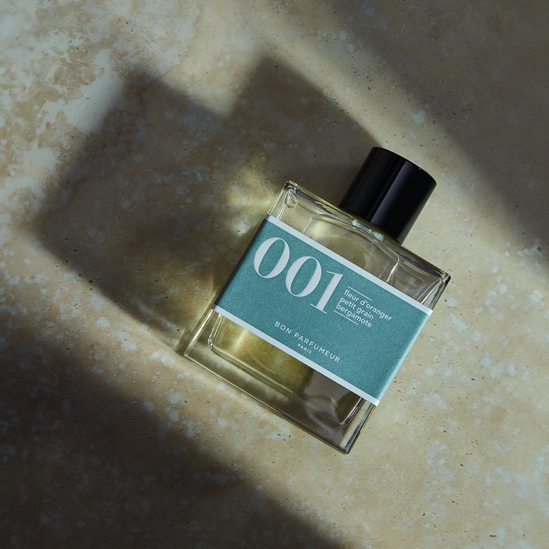 Eau de parfum 001 à la fleur d'oranger, au petit grain et à la bergamote